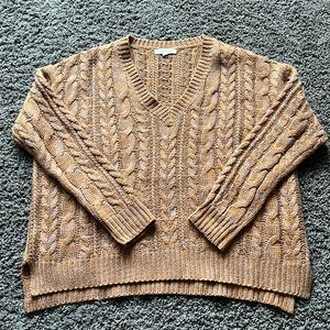 Soft, oversized cable knit sweater